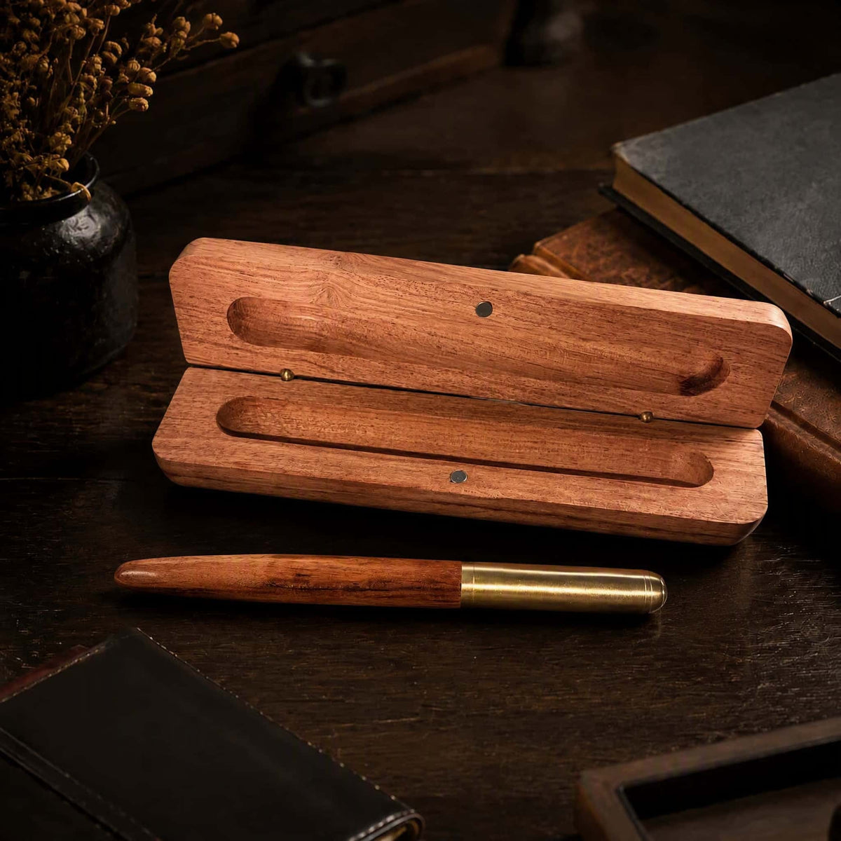 HAVNMADE wooden pen gift set open case with brass pen on dark wood desk